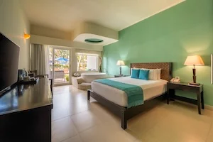 https://www.palmarbeachresortandspa.com.mx/galleries/Suites/PBRM-Suites-01.webp